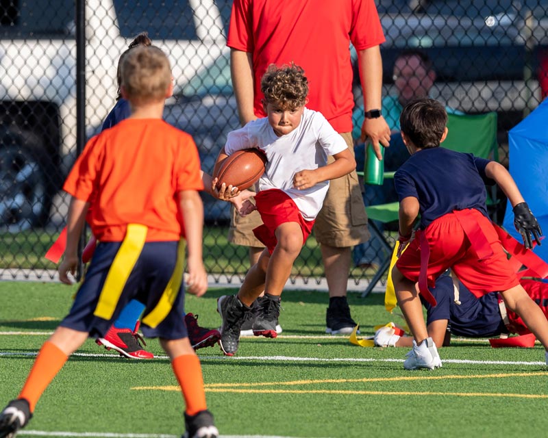 Kids playing football