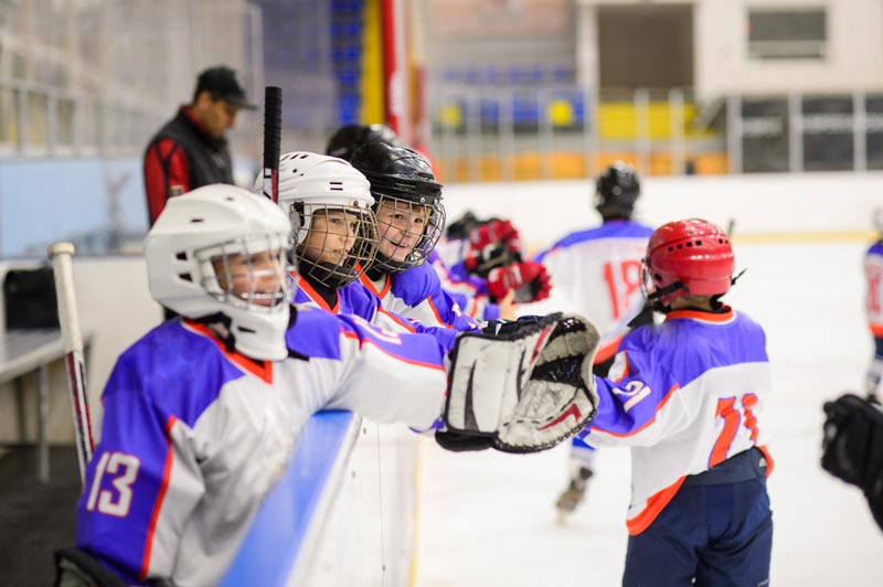 Kids playing hockey